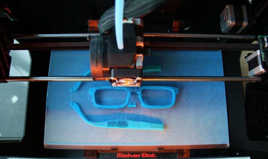3D printing using the Makerbot Replicator 2 3D printer. Credits: Aaron Porterfield.